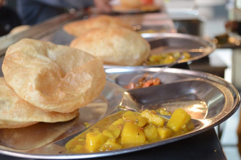 Poori Chane served with Potato Gravy