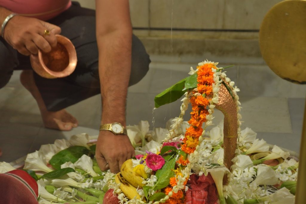 Performing one of the ritual in a Hindu temple
